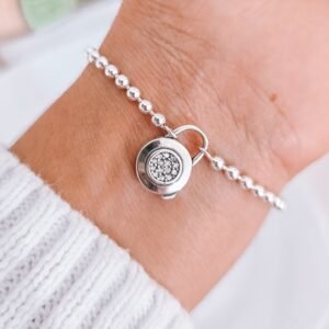 Pulsera de bolitas y dije candado