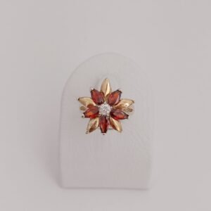 Anillo de flor de plata con oro