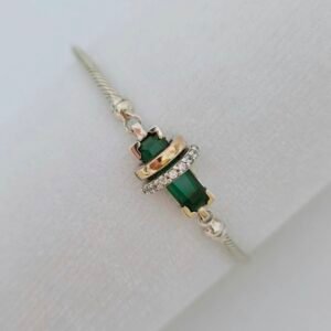 Pulsera plata con oro color esmeralda