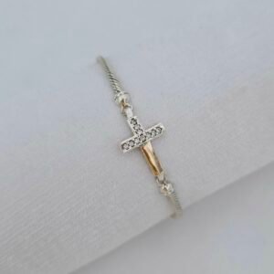 Pulsera de plata con oro y cruz