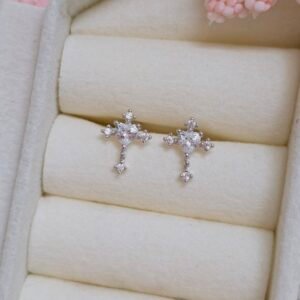 aretes de cruz con corazón