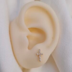 Aretes de cruz dorada