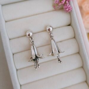 Aretes largos de flor