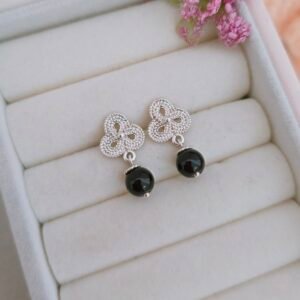 Aretes colgantes de onix