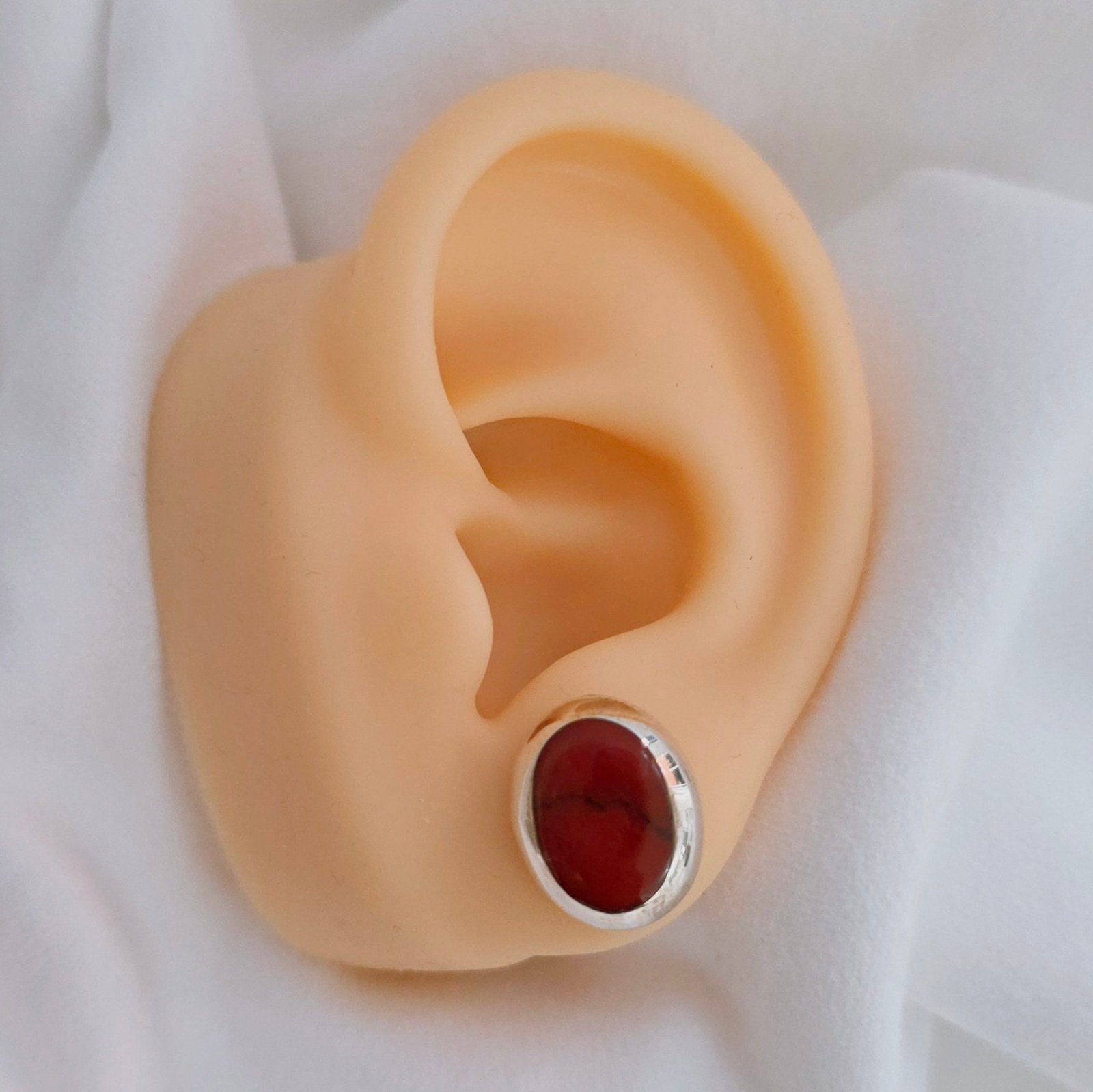 Aretes howlita roja